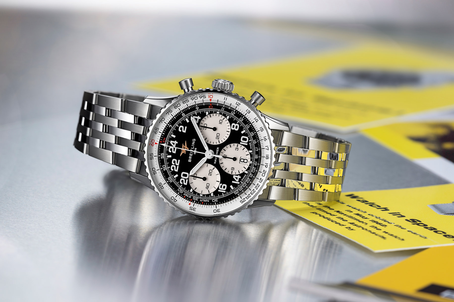 02 Breitling Navitimer B02 Chronograph 41 Cosmonaute AB0230211B1A1 Steel Bracelet RGB Breitling Navitimer B02 Chronograph 41 Cosmonaute AB0230211B1A1 on its side, crown up