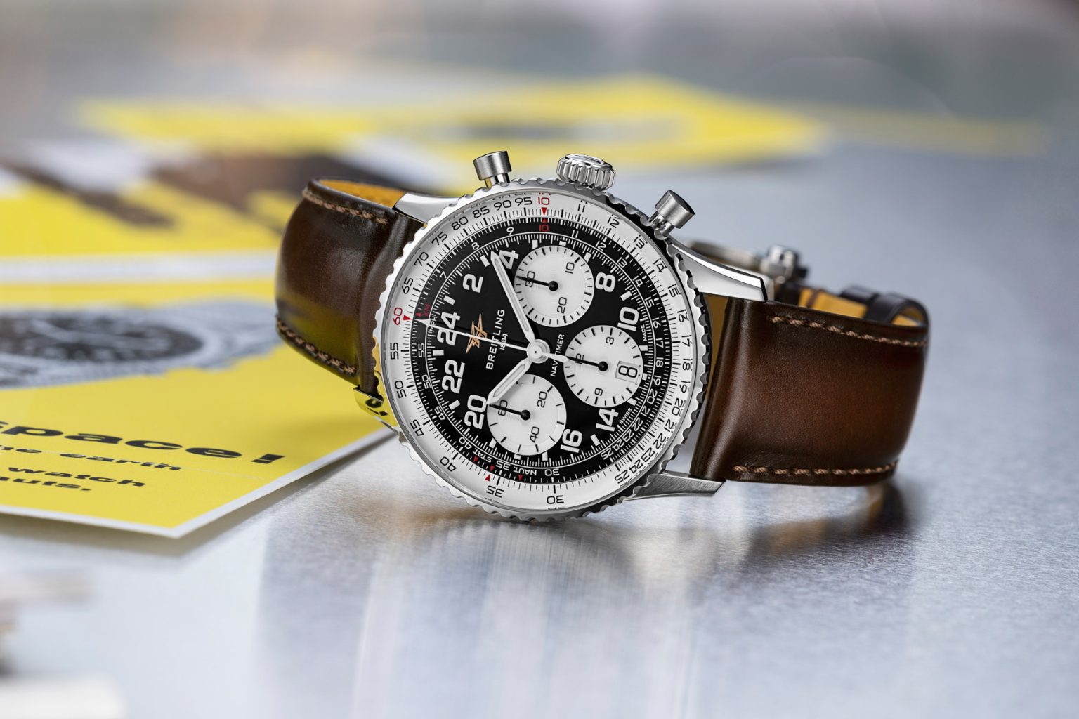 Breitling Navitimer B02 Chronograph 41 Cosmonaute AB0230211B1X1 on its side, crown up