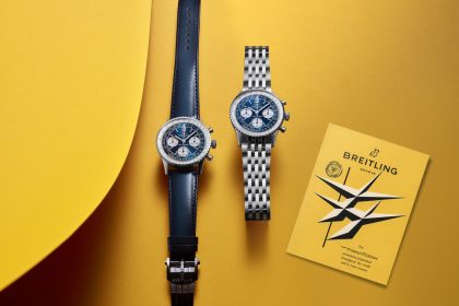 Breitling Navitimer B09 Chronograph 41 AB0950211C1X1 and AB0950211C1A1 side by side, flat-lay